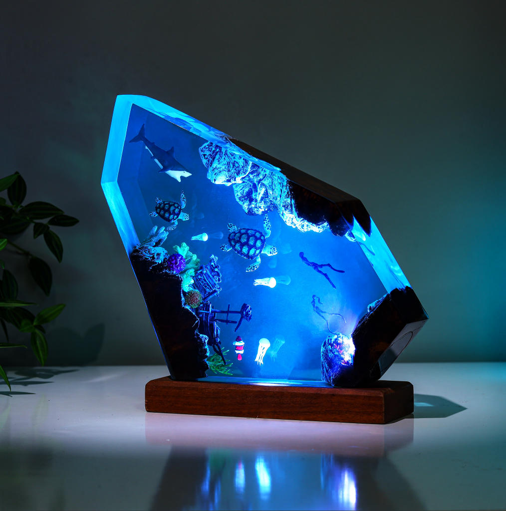 Orca and divers night light