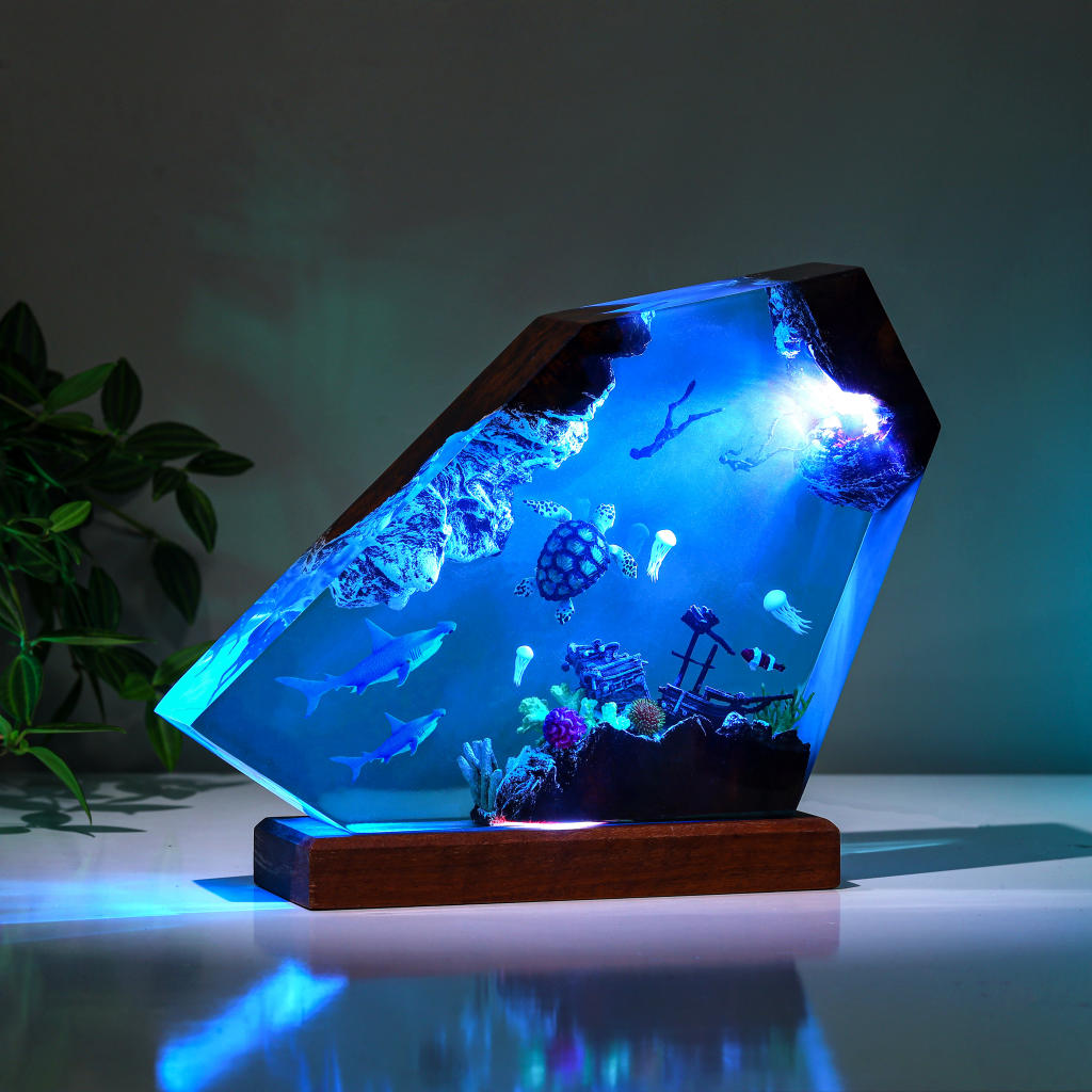 Orca and divers night light